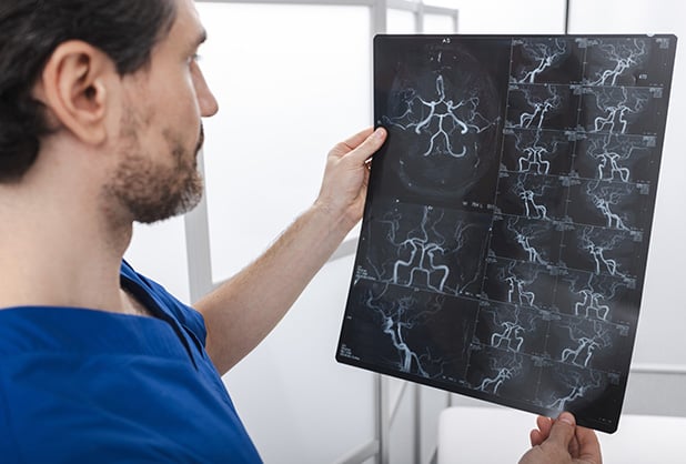 ARSA - ARMS Website-doctor-reading-scan